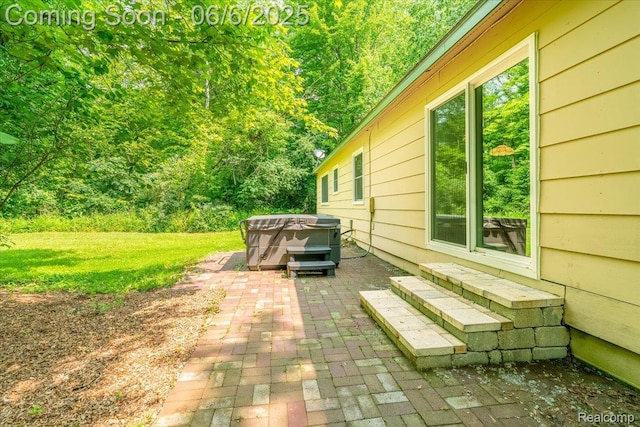 22850 Sumpter Rd, Belleville, MI 48111 - view of patio with a hot tub