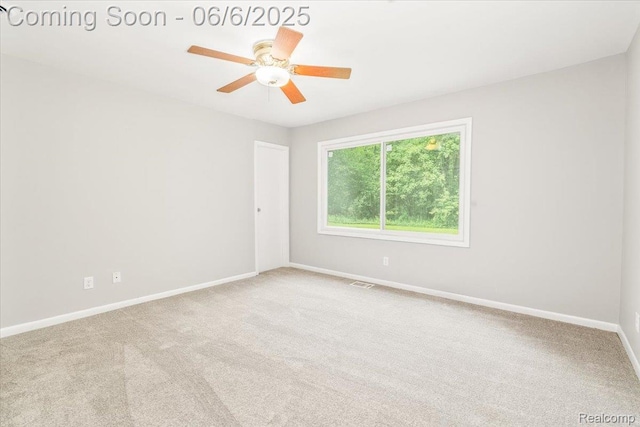 22850 Sumpter Rd, Belleville, MI 48111 - carpeted empty room featuring baseboards and a ceiling fan