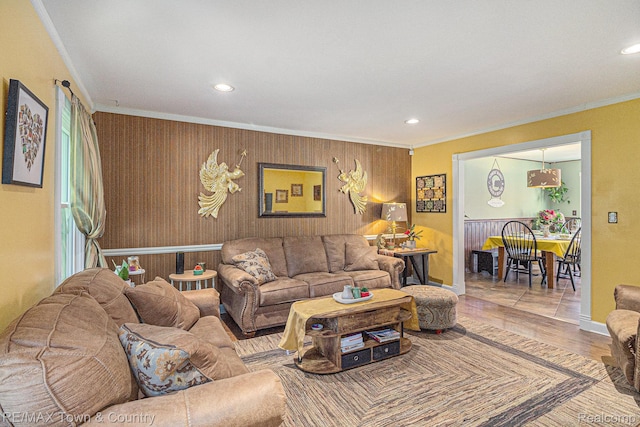 813 Birchwood Dr, Flushing, MI 48433 - living room with crown molding, recessed lighting, wood finished floors, baseboards, and wood walls