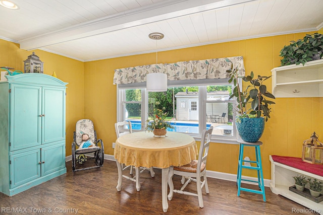 813 Birchwood Dr, Flushing, MI 48433 - dining area featuring dark wood finished floors, crown molding, wood ceiling with exposed beams, and baseboards