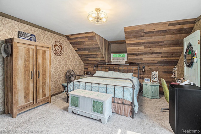 813 Birchwood Dr, Flushing, MI 48433 - bedroom with carpet, a chandelier, wood walls, vaulted ceiling, and wallpapered walls