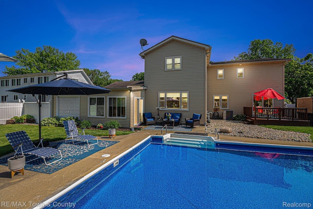 813 Birchwood Dr, Flushing, MI 48433 - view of swimming pool with a wooden deck, an outdoor living space, and a patio