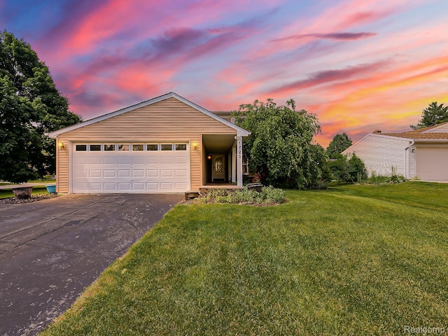 1725 Windingway Dr, Wixom, MI 48393 - single story home featuring asphalt driveway and a lawn