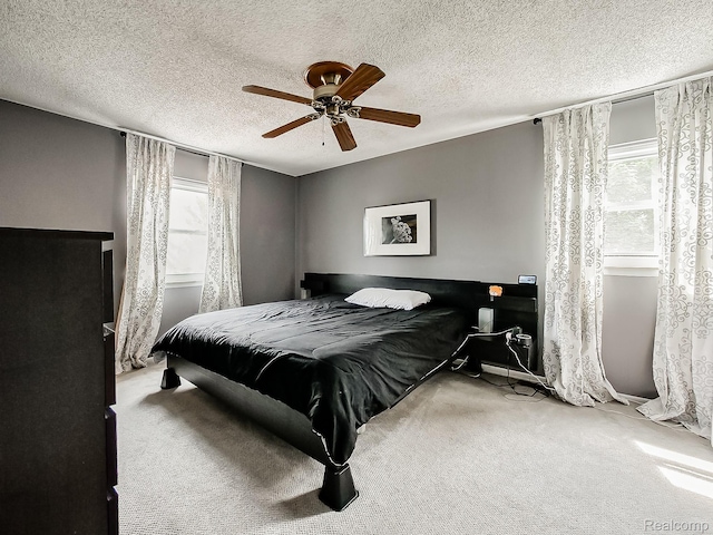1725 Windingway Dr, Wixom, MI 48393 - bedroom featuring carpet floors, a textured ceiling, and ceiling fan