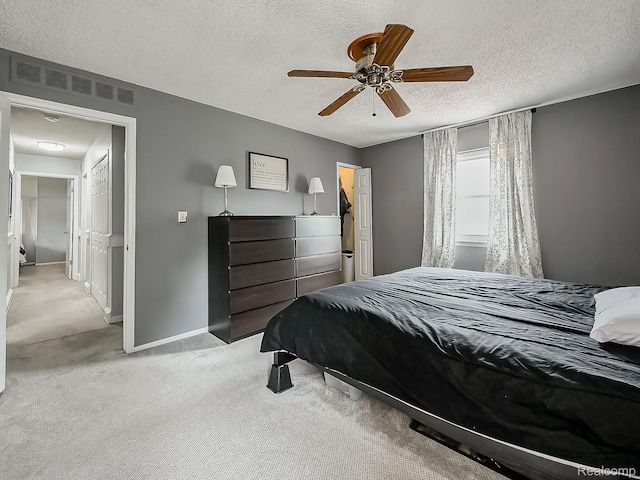 1725 Windingway Dr, Wixom, MI 48393 - bedroom with light carpet, a textured ceiling, baseboards, and a ceiling fan