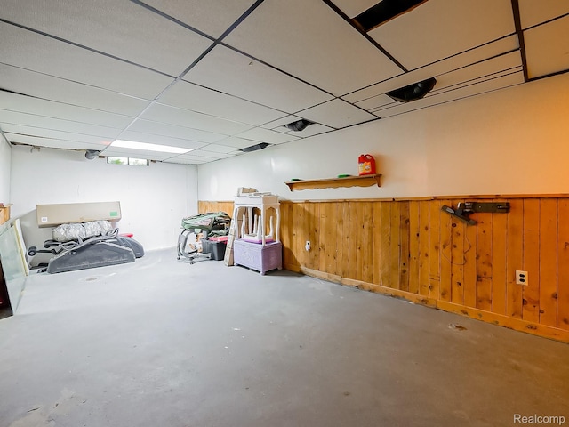 1725 Windingway Dr, Wixom, MI 48393 - finished below grade area featuring wood walls and a wainscoted wall