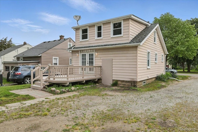 3345 Curwood St, Bloomfield Hills, MI 48329 - back of house with a wooden deck, french doors, and roof with shingles