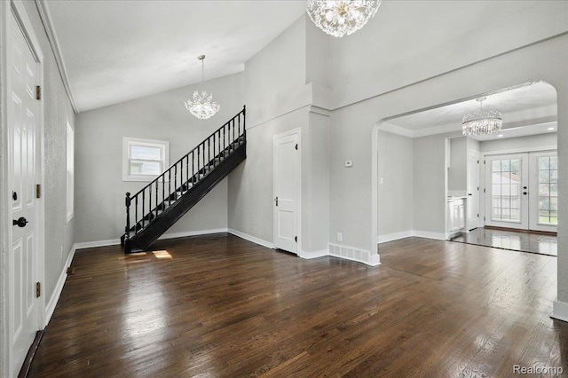 3345 Curwood St, Bloomfield Hills, MI 48329 - foyer featuring a chandelier, arched walkways, dark wood-style flooring, stairway, and baseboards