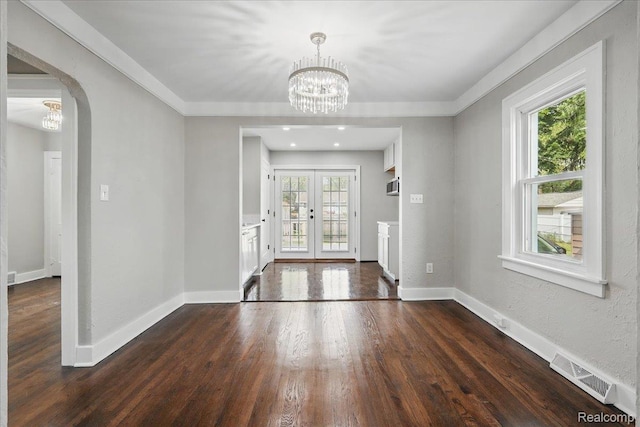 3345 Curwood St, Bloomfield Hills, MI 48329 - entryway featuring a chandelier, dark wood-type flooring, french doors, arched walkways, and baseboards