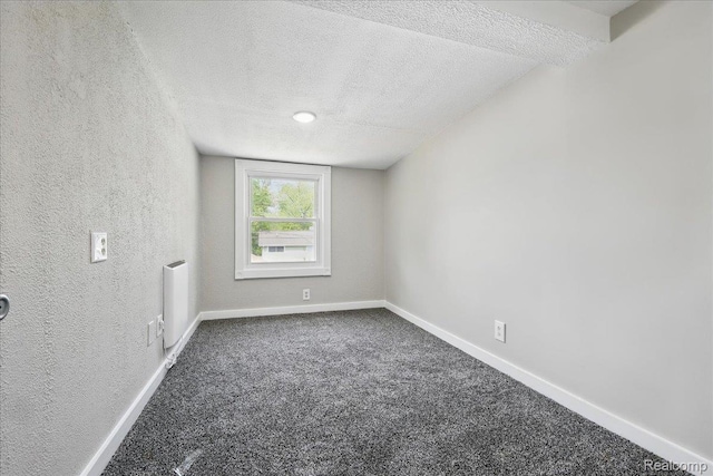 3345 Curwood St, Bloomfield Hills, MI 48329 - carpeted spare room with a textured ceiling and baseboards