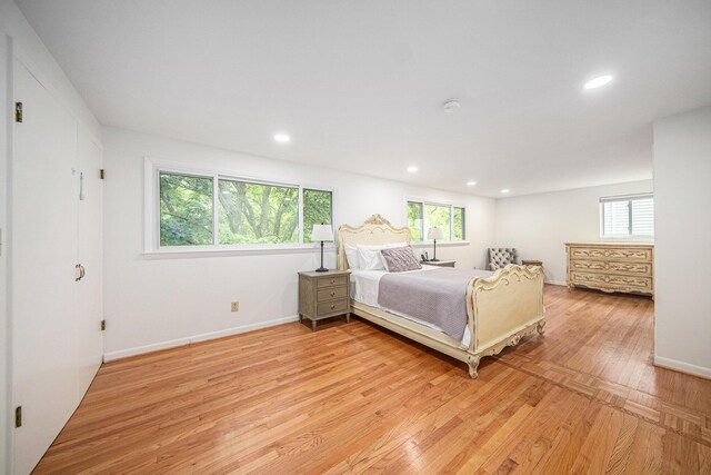 2402 Victoria Ave, Ann Arbor, MI 48104 - bedroom with light wood-style floors, baseboards, and recessed lighting