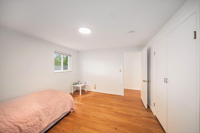 2402 Victoria Ave, Ann Arbor, MI 48104 - bedroom with light wood finished floors and baseboards
