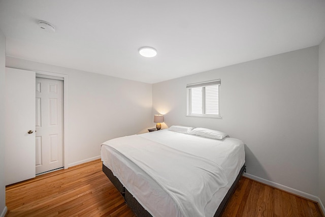 2402 Victoria Ave, Ann Arbor, MI 48104 - bedroom with baseboards and light wood-style floors