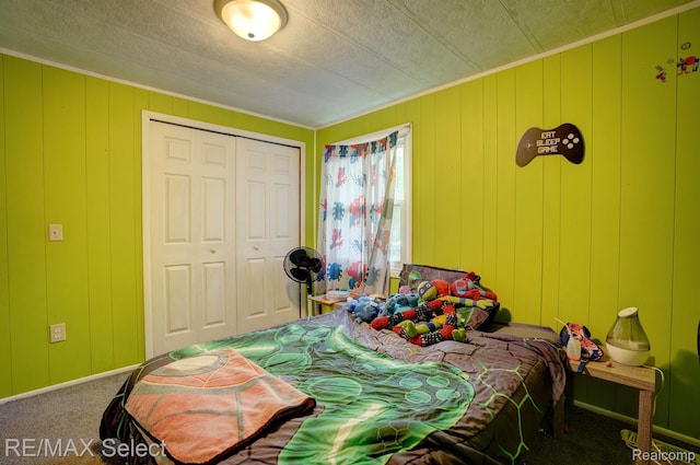 10304 Nichols Rd, Montrose, MI 48457 - carpeted bedroom featuring a closet and ornamental molding