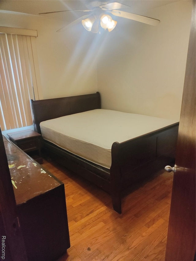 20022 Hanna St, Highland Park, MI 48203 - bedroom featuring wood finished floors and ceiling fan