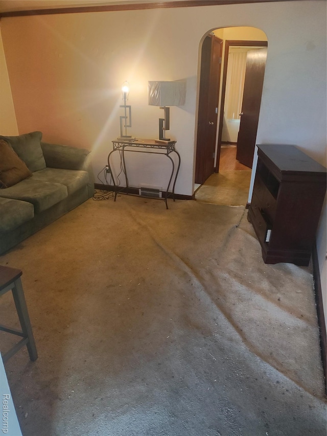 20022 Hanna St, Highland Park, MI 48203 - living area with arched walkways and carpet
