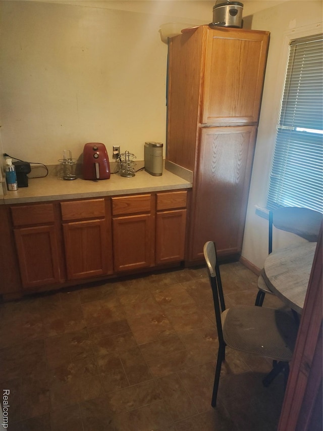 20022 Hanna St, Highland Park, MI 48203 - kitchen with light countertops and brown cabinets