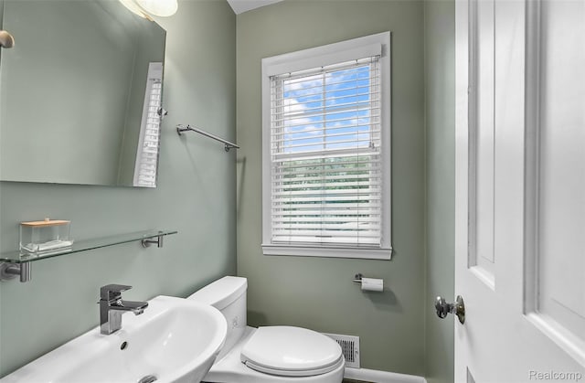 100 Overhill Rd, Bloomfield Hills, MI 48301 - half bathroom featuring a sink and toilet