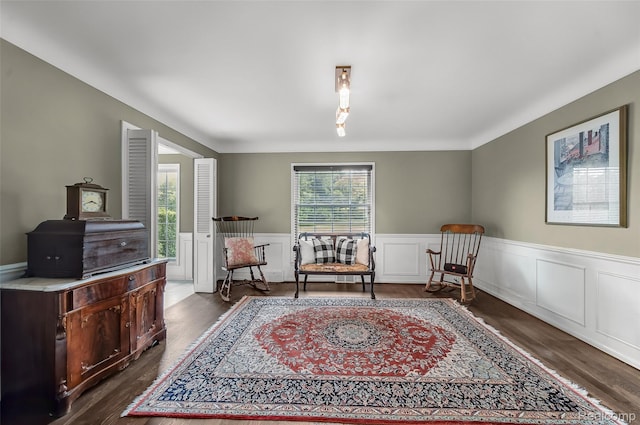 100 Overhill Rd, Bloomfield Hills, MI 48301 - living area featuring plenty of natural light, a wainscoted wall, and dark wood-style flooring