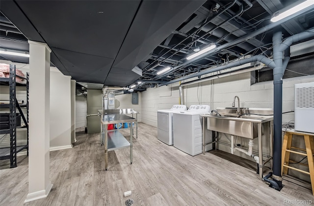 100 Overhill Rd, Bloomfield Hills, MI 48301 - finished basement featuring a sink, independent washer and dryer, wood finished floors, electric panel, and concrete block wall