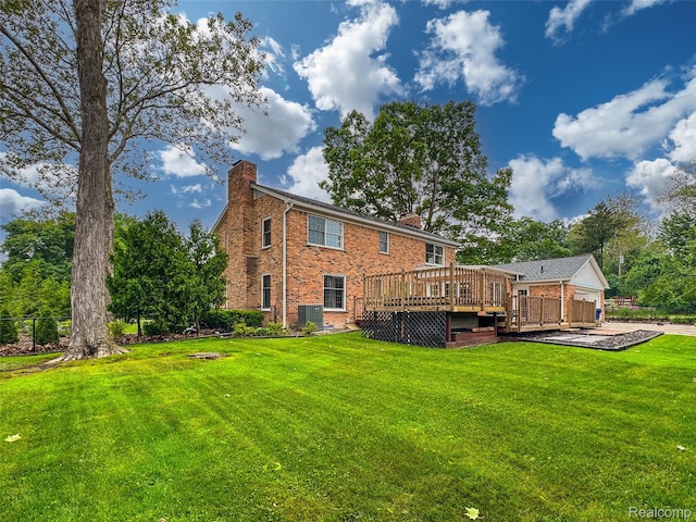 100 Overhill Rd, Bloomfield Hills, MI 48301 - back of house with a chimney, a deck, a yard, and brick siding