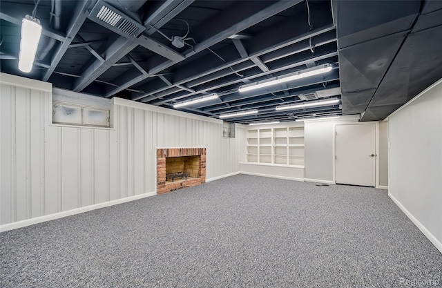 100 Overhill Rd, Bloomfield Hills, MI 48301 - finished below grade area featuring carpet, a brick fireplace, and baseboards