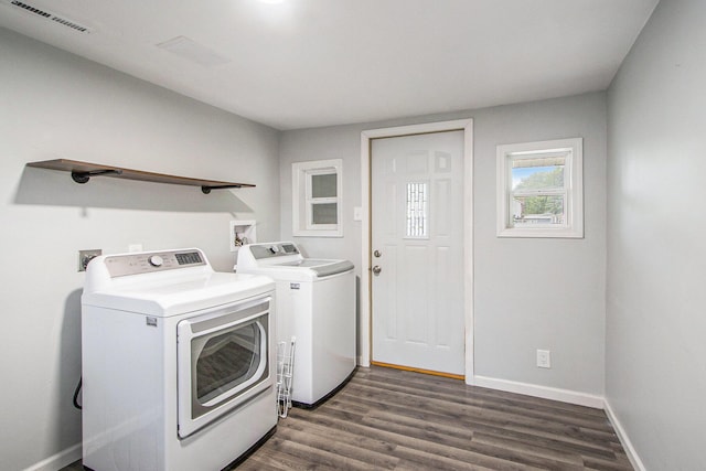 854 Upton Ave, Battle Creek, MI 49037 - laundry room featuring washer and clothes dryer, dark wood finished floors, and baseboards