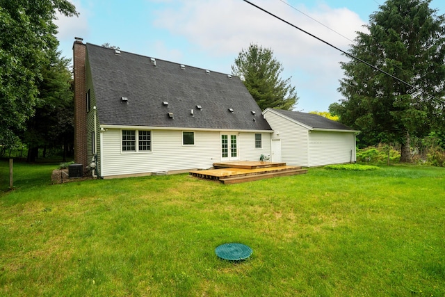 2961 E B Ave, Plainwell, MI 49080 - rear view of property featuring a chimney, central AC, a deck, a yard, and roof with shingles