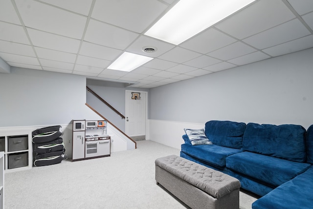 2961 E B Ave, Plainwell, MI 49080 - carpeted living room featuring stairs and a drop ceiling