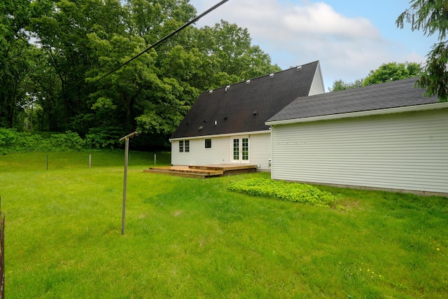 2961 E B Ave, Plainwell, MI 49080 - rear view of house with a deck and a lawn