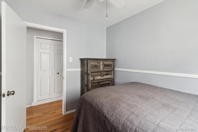 13471 Longtin St, Southgate, MI 48195 - bedroom with wood finished floors, ceiling fan, and baseboards