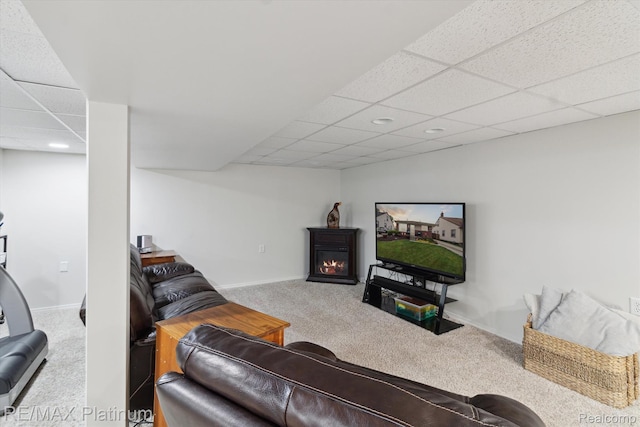 13471 Longtin St, Southgate, MI 48195 - carpeted living room featuring a paneled ceiling, a warm lit fireplace, recessed lighting, and baseboards