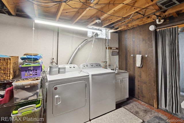 13471 Longtin St, Southgate, MI 48195 - washroom featuring washer and dryer and cabinet space
