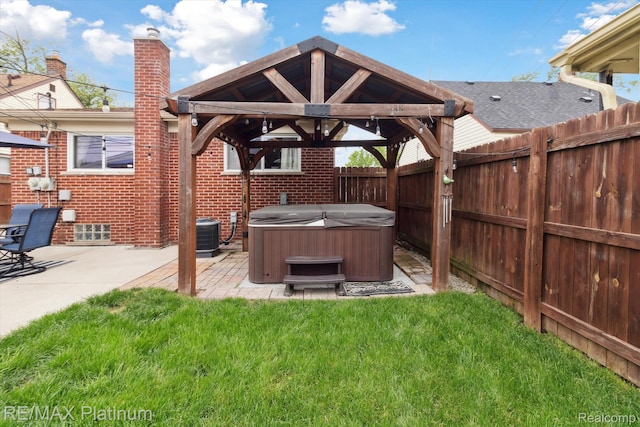 13471 Longtin St, Southgate, MI 48195 - view of yard with a hot tub, a gazebo, a patio area, and central AC unit
