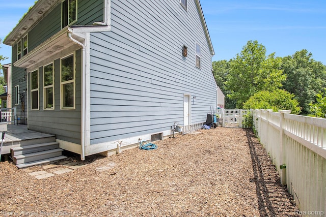 1653 Crab Apple Dr, Ypsilanti, MI 48198 - view of property exterior featuring a fenced backyard and a deck