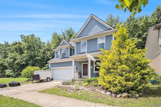 1653 Crab Apple Dr, Ypsilanti, MI 48198 - view of front facade featuring an attached garage and concrete driveway
