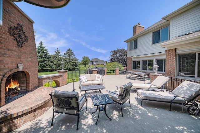 4251 Fleming Way, Plymouth, MI 48170 - view of patio / terrace with an outdoor living space with a fireplace
