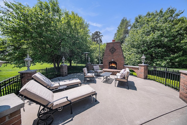 4251 Fleming Way, Plymouth, MI 48170 - view of patio / terrace with an outdoor living space with a fireplace and view of scattered trees