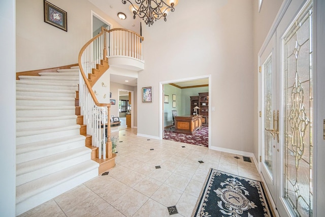 4251 Fleming Way, Plymouth, MI 48170 - entryway featuring stairway, baseboards, light tile patterned floors, and a towering ceiling