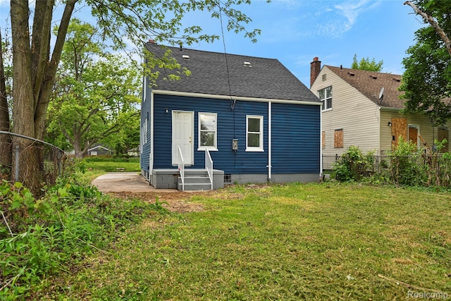 17594 Vaughan St, Detroit, MI 48219 - rear view of property with roof with shingles