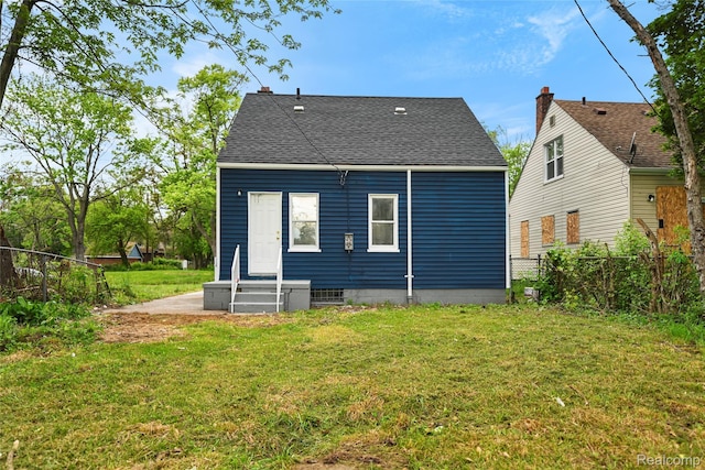 17594 Vaughan St, Detroit, MI 48219 - rear view of house with roof with shingles