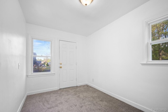 17594 Vaughan St, Detroit, MI 48219 - unfurnished room featuring plenty of natural light, baseboards, and carpet