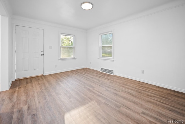 17594 Vaughan St, Detroit, MI 48219 - spare room featuring wood finished floors and baseboards