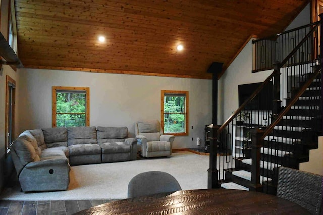 2735 Nestrom Rd, Muskegon, MI 49445 - living area featuring stairway, wood ceiling, baseboards, high vaulted ceiling, and wood finished floors