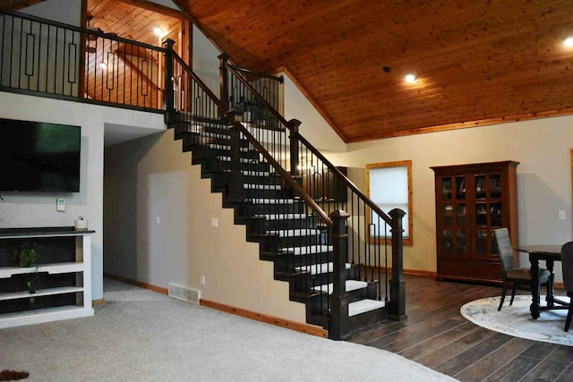 2735 Nestrom Rd, Muskegon, MI 49445 - staircase with baseboards, high vaulted ceiling, wood ceiling, and wood finished floors