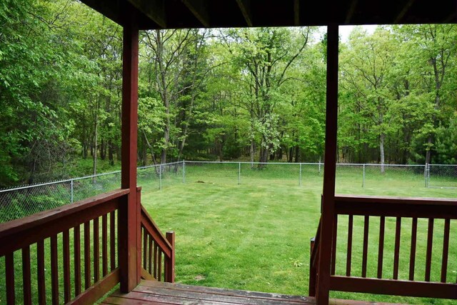 2735 Nestrom Rd, Muskegon, MI 49445 - view of yard with a forest view