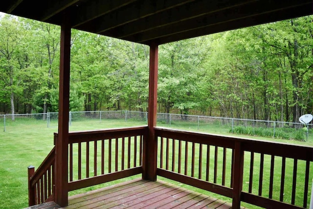 2735 Nestrom Rd, Muskegon, MI 49445 - wooden terrace featuring a forest view