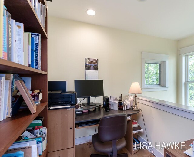 12857 Wilderness Trl, Grand Haven, MI 49417 - home office featuring wood finished floors and recessed lighting