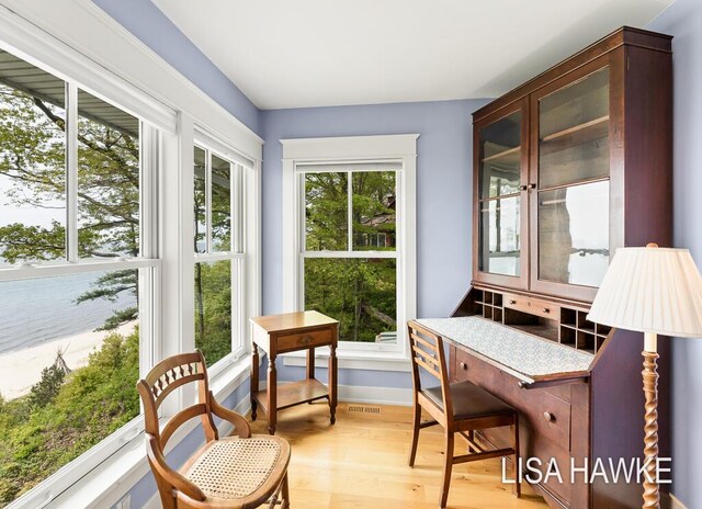12857 Wilderness Trl, Grand Haven, MI 49417 - sunroom / solarium featuring french doors
