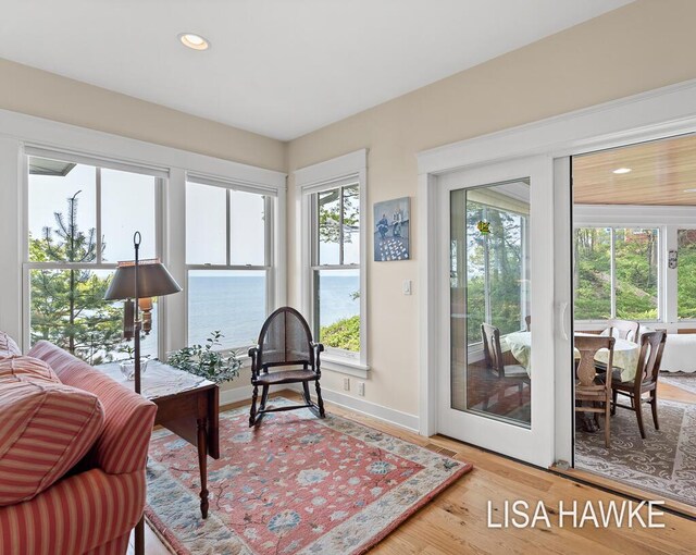 12857 Wilderness Trl, Grand Haven, MI 49417 - sunroom / solarium with recessed lighting, baseboards, and wood finished floors